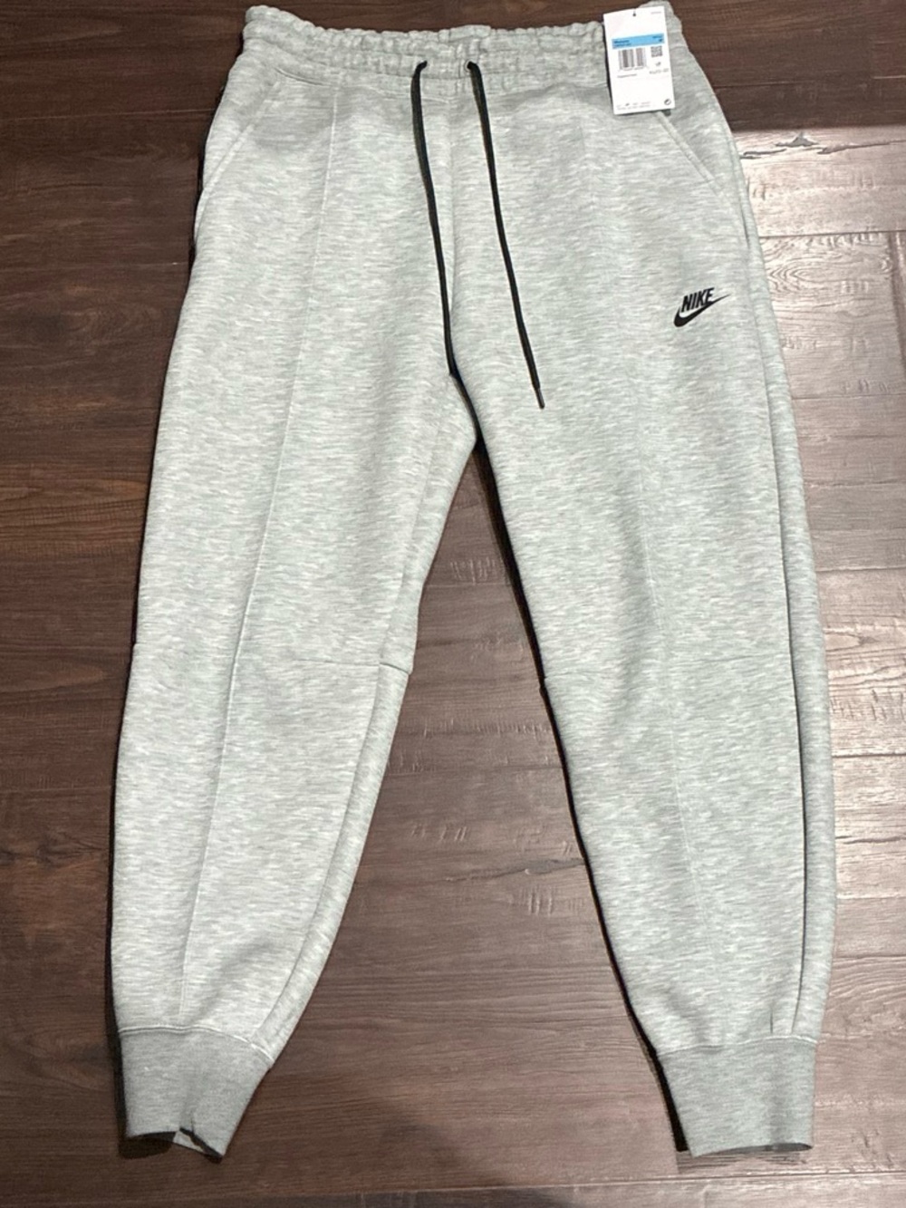 Women’s grey nike tech pants